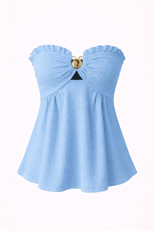Light blue strapless top with a decorative button on a white background