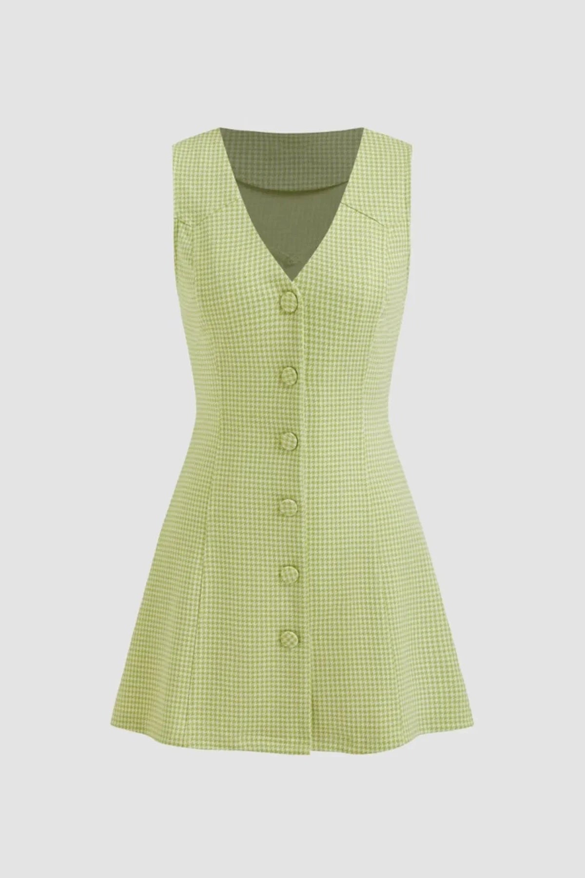 Green checkered dress with buttons on a light gray background