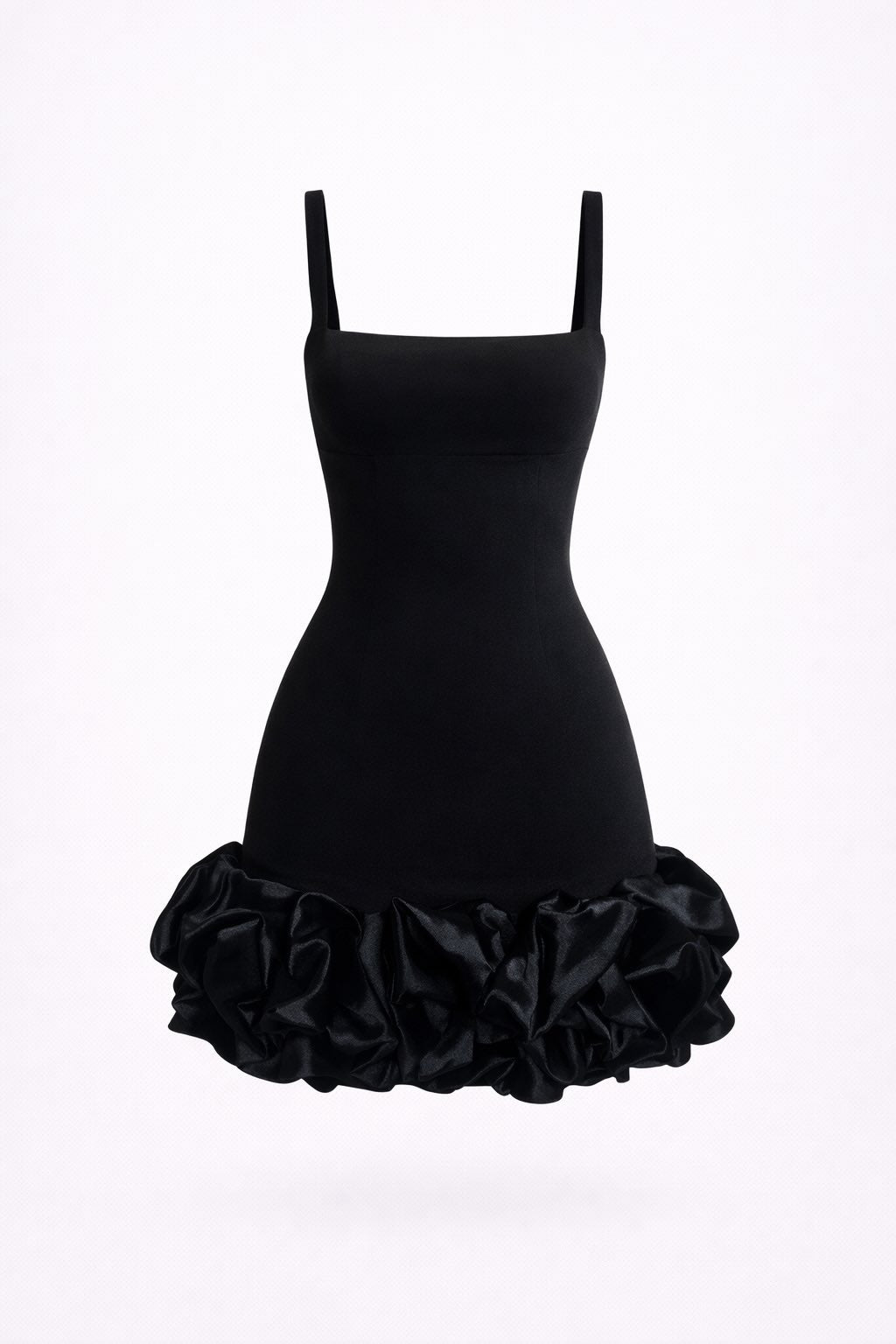 Black dress with ruffled skirt on a white background