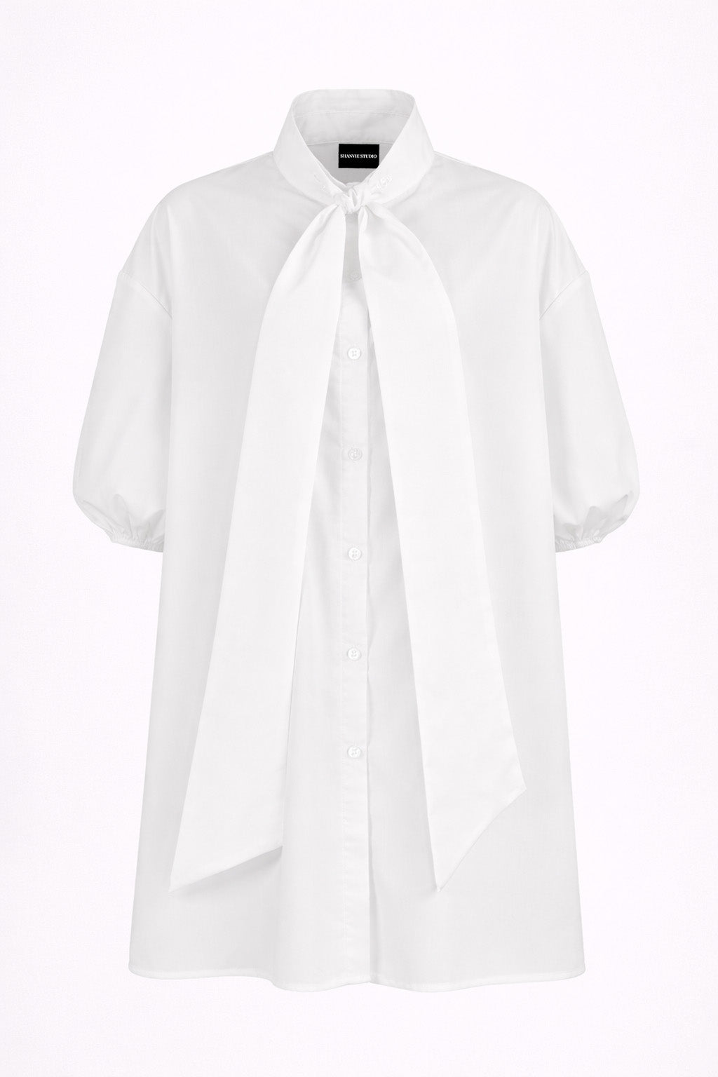 White shirt with a tie neckline on a white background