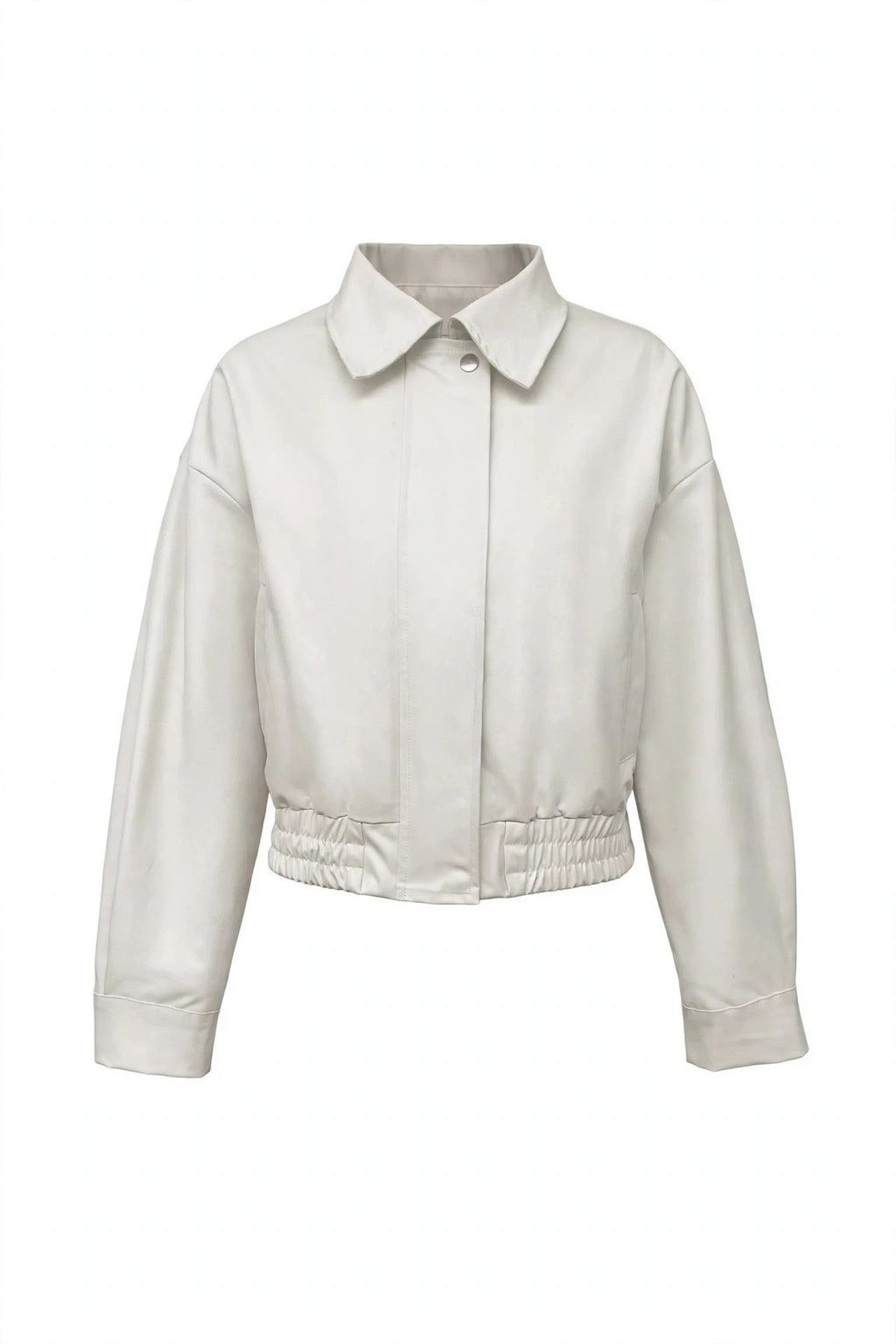 A cropped, long-sleeve jacket in a light cream or off-white color, featuring a pointed collar, button front, and elasticized gathered waist, shown against a plain white background.